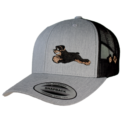 Caricature of a jumping rottweiler embroidered on a gray and black snap back trucker hat.